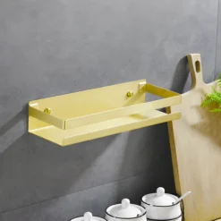 Półka łazienkowa wisząca pod prysznic kuchenna metalowa DELVANT BANO złota szczotkowana 20 cm